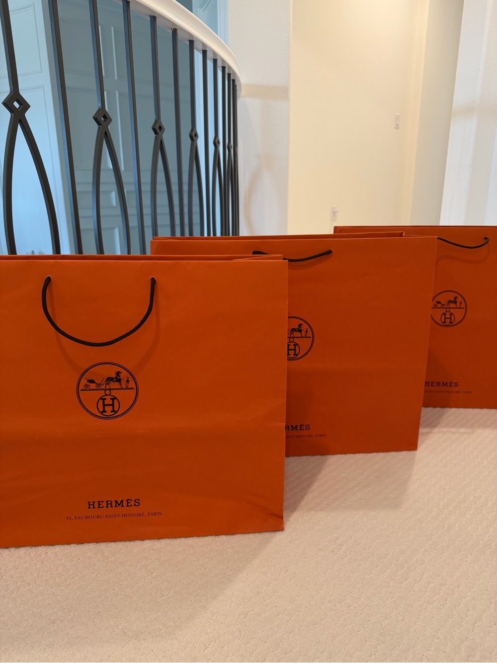 3 very large Hermes orange shopping bags